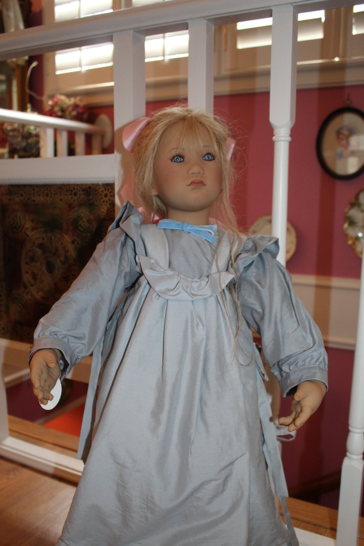 Skille doll from the 2000 collection by artist Annette Himstedt, holding a smaller companion doll named Bibi.