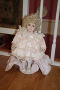 Vintage Porcelain Doll in Pink Lace Ruffle Dress – Blonde Curly Hair with Display Stand