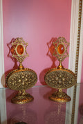 Pair of Vintage Hollywood Regency Ormolu Filigree Perfume Bottles with Amber Glass Accents