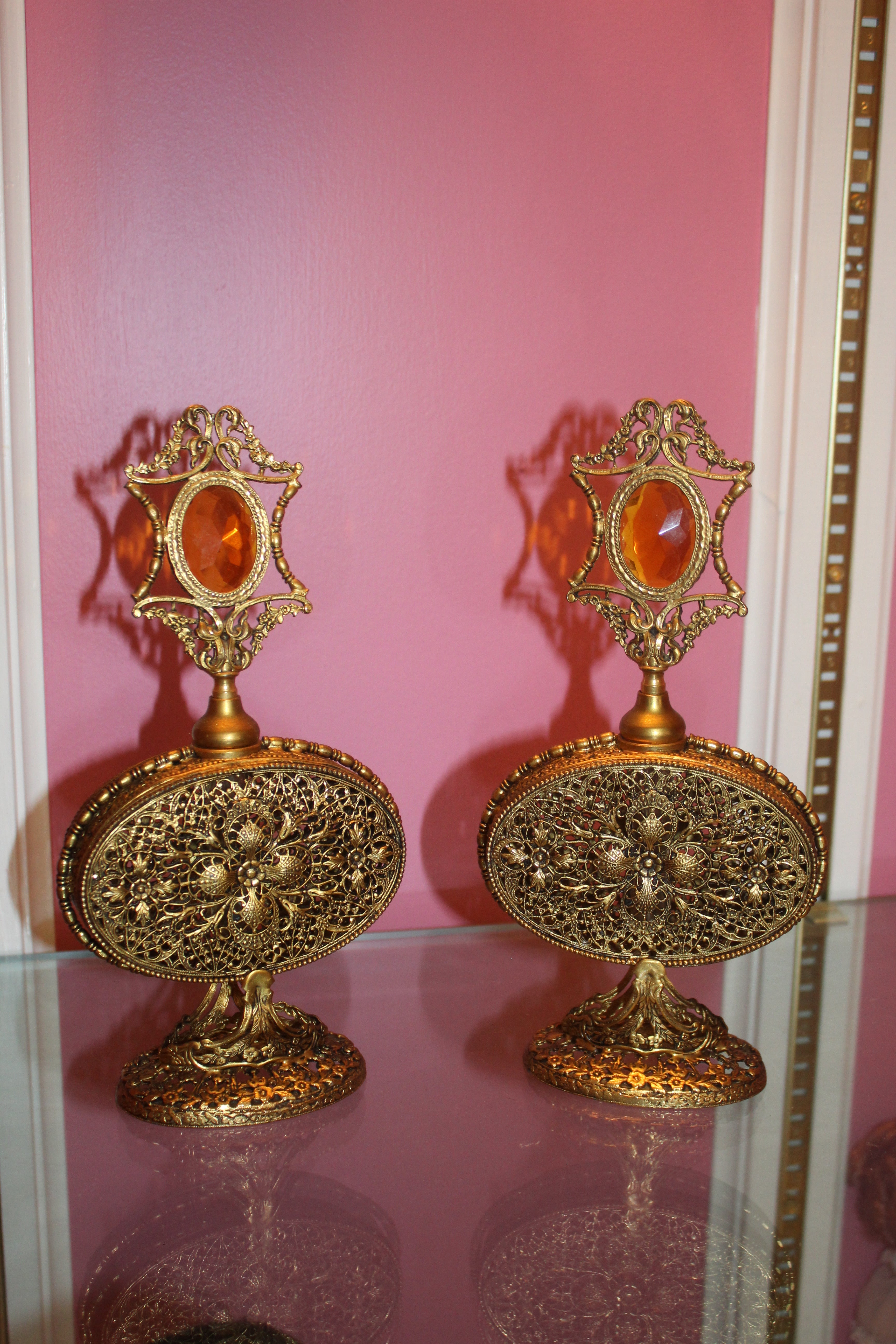 Pair of Vintage Hollywood Regency Ormolu Filigree Perfume Bottles with Amber Glass Accents
