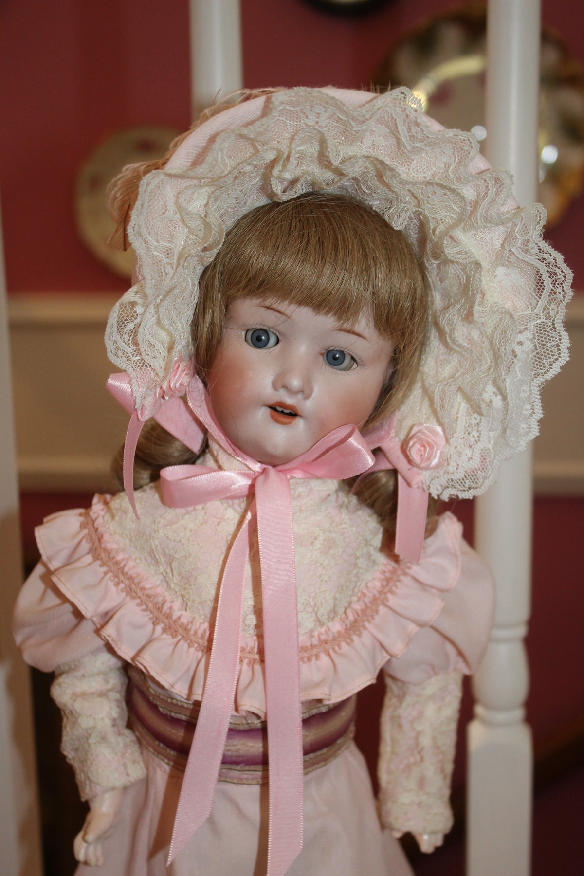 Vintage Porcelain Girl Doll in Pink Ruffled Dress & Lace Bonnet – Collector Doll